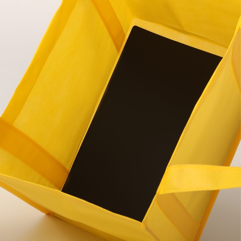 200 x custom non woven shopping tote bags with cardboard bases.